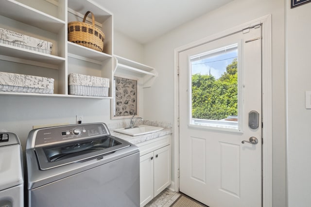 607 11th St, Galveston, TX 77550 - laundry area featuring cabinet space and washer and dryer