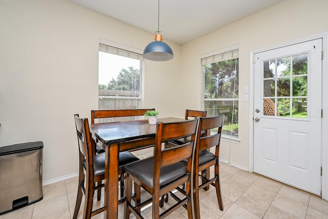 28503 Cece Glen Ct, Spring, TX 77386 - dining space with healthy amount of natural light and light tile patterned floors