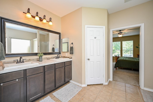 28503 Cece Glen Ct, Spring, TX 77386 - ensuite bathroom featuring double vanity, tile patterned flooring, and a ceiling fan