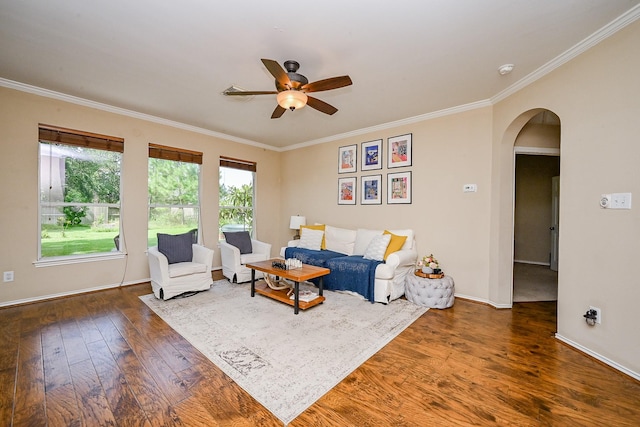 28503 Cece Glen Ct, Spring, TX 77386 - living area with arched walkways, crown molding, a ceiling fan, and wood finished floors