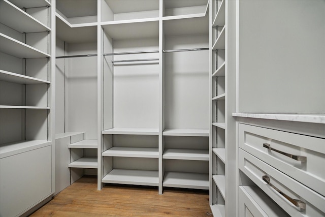 2019 Du Barry Ln, Houston, TX 77018 - walk in closet with wood finished floors