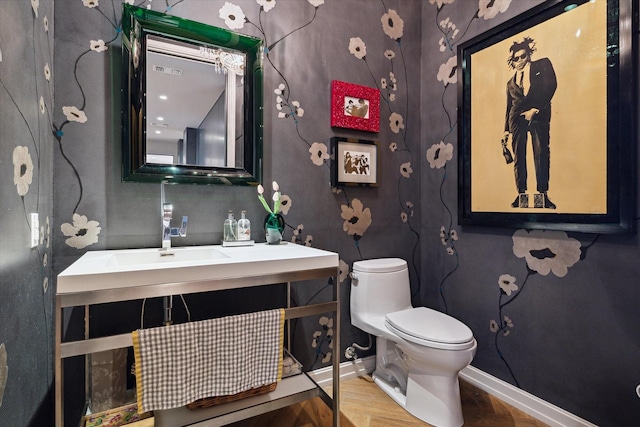 2019 Du Barry Ln, Houston, TX 77018 - half bath featuring toilet and wood finished floors
