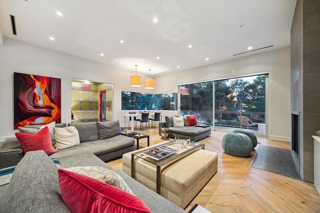 2019 Du Barry Ln, Houston, TX 77018 - living room featuring recessed lighting, a large fireplace, and parquet floors