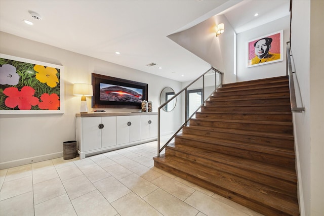 2019 Du Barry Ln, Houston, TX 77018 - stairway featuring tile patterned floors and recessed lighting