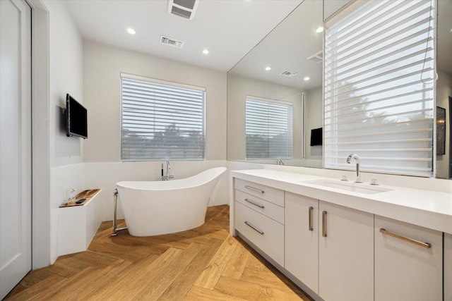 2019 Du Barry Ln, Houston, TX 77018 - full bathroom featuring vanity, a soaking tub, recessed lighting, and a shower with door