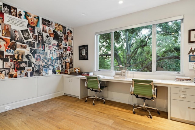 2019 Du Barry Ln, Houston, TX 77018 - office featuring built in desk, light wood-style floors, healthy amount of natural light, and recessed lighting