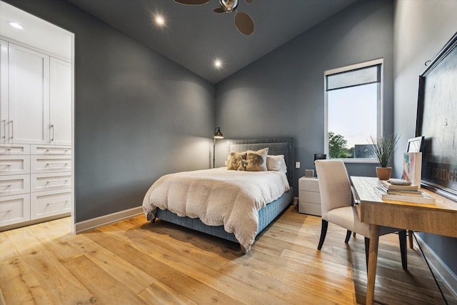 2019 Du Barry Ln, Houston, TX 77018 - bedroom with high vaulted ceiling, light wood finished floors, recessed lighting, and an office area