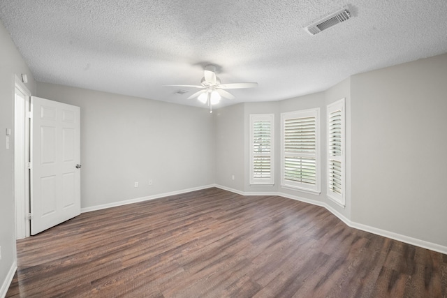 2822 Roseheath Ln, Houston, TX 77073 - unfurnished room featuring a ceiling fan, dark wood finished floors, and a textured ceiling