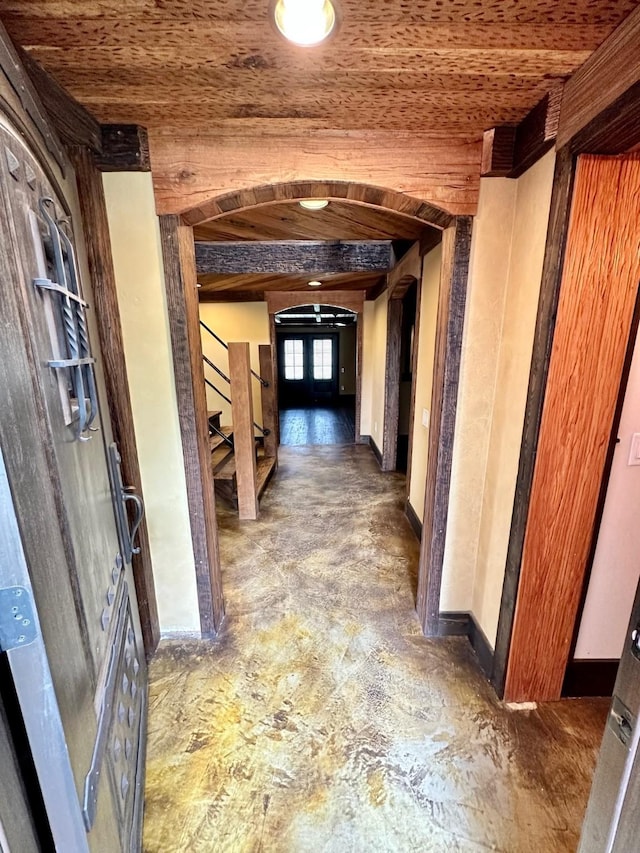 4842 Green Trail Dr, Houston, TX 77084 - hall featuring stairs, arched walkways, and wood ceiling