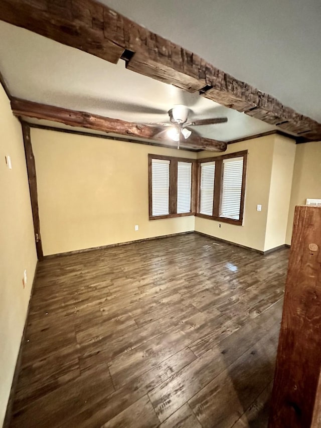 4842 Green Trail Dr, Houston, TX 77084 - empty room featuring ceiling fan, dark wood-type flooring, and beamed ceiling