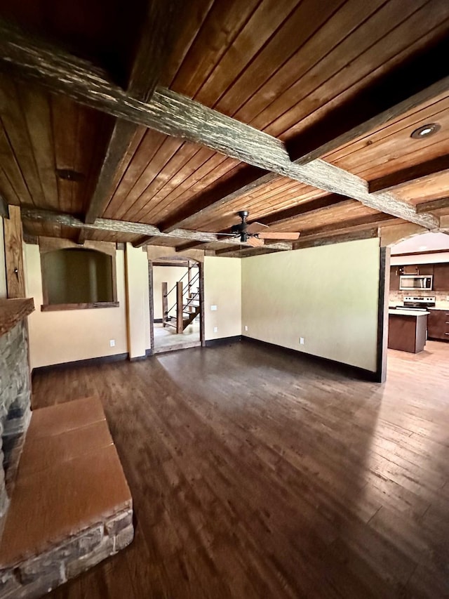 4842 Green Trail Dr, Houston, TX 77084 - unfurnished living room with stairs, wood-type flooring, ceiling fan, and a wood ceiling with exposed beams