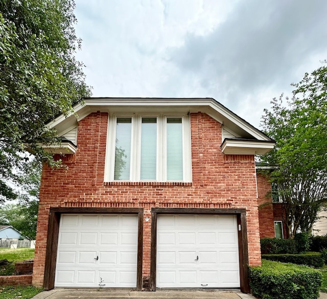 4842 Green Trail Dr, Houston, TX 77084 - view of front of home featuring brick siding and driveway