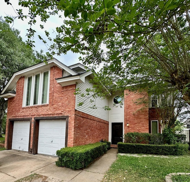 4842 Green Trail Dr, Houston, TX 77084 - view of front of house with brick siding, concrete driveway, and an attached garage