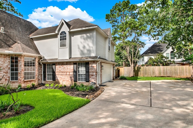 13718 Gainesway Dr, Cypress, TX 77429 - traditional-style home with driveway, brick siding, an attached garage, and a shingled roof