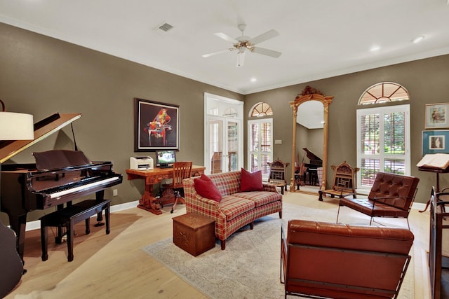 13718 Gainesway Dr, Cypress, TX 77429 - living area featuring a ceiling fan, wood finished floors, crown molding, and recessed lighting