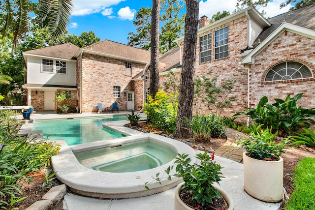 13718 Gainesway Dr, Cypress, TX 77429 - swimming pool with an in-ground hot tub and a patio area