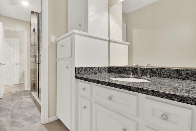 13718 Gainesway Dr, Cypress, TX 77429 - bathroom featuring marble look tile flooring, vanity, and a shower stall