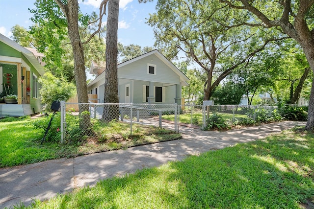 317 11th Ave N, Texas City, TX 77590 - bungalow-style home featuring a gate and a fenced front yard