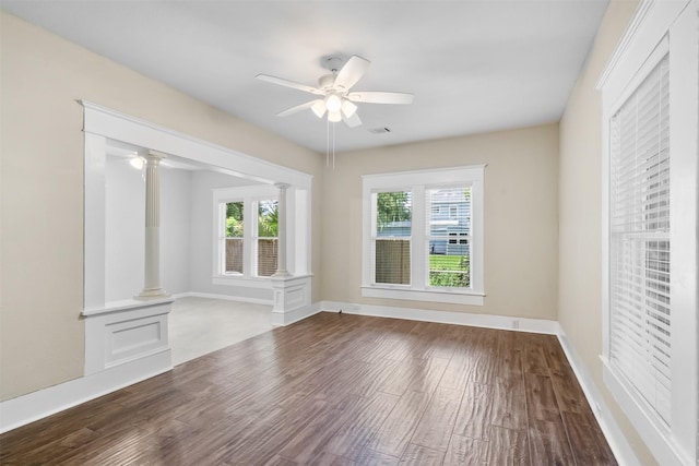 317 11th Ave N, Texas City, TX 77590 - unfurnished living room with decorative columns, wood finished floors, and ceiling fan
