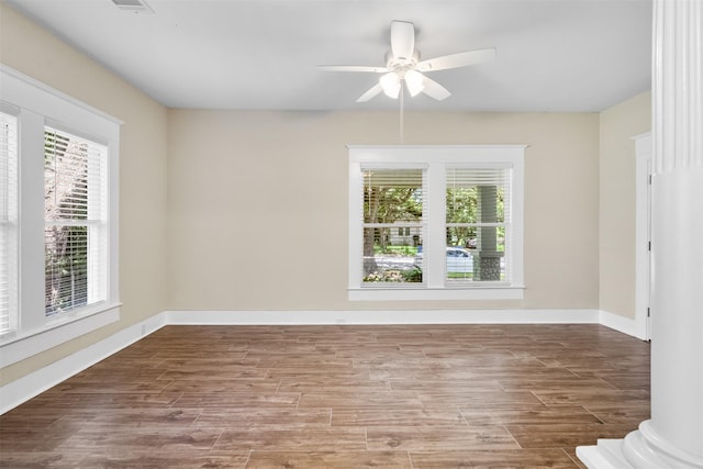 317 11th Ave N, Texas City, TX 77590 - unfurnished room featuring healthy amount of natural light, ceiling fan, and wood finished floors