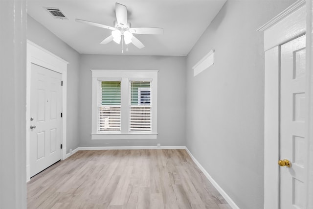 317 11th Ave N, Texas City, TX 77590 - empty room featuring light wood-style floors and a ceiling fan