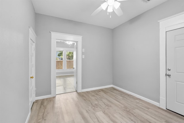 317 11th Ave N, Texas City, TX 77590 - unfurnished room featuring ceiling fan and light wood finished floors