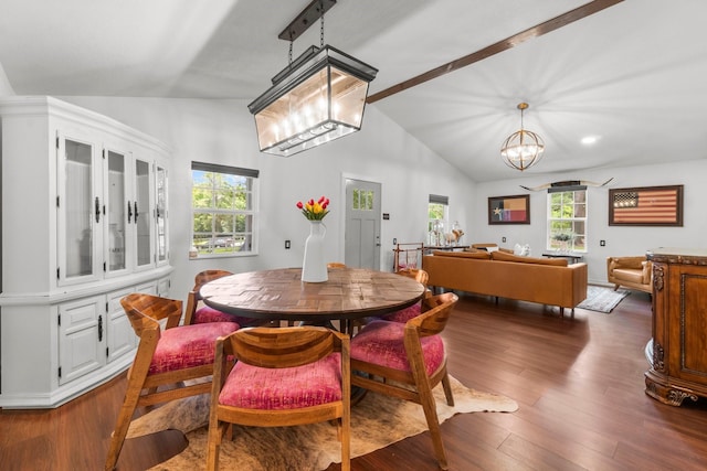 8851 US Highway 59 N, Livingston, TX 77351 - dining space featuring vaulted ceiling, a chandelier, healthy amount of natural light, and dark wood-style flooring