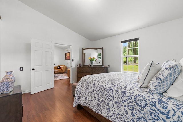 8851 US Highway 59 N, Livingston, TX 77351 - bedroom featuring dark wood-style floors and lofted ceiling