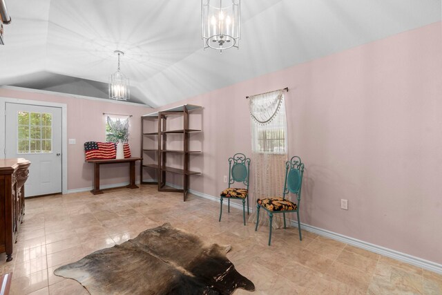 8851 US Highway 59 N, Livingston, TX 77351 - living area featuring a chandelier and vaulted ceiling