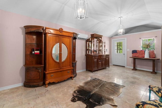 8851 US Highway 59 N, Livingston, TX 77351 - foyer featuring a wall mounted air conditioner, a chandelier, and vaulted ceiling
