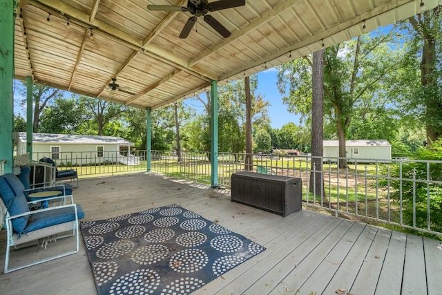 8851 US Highway 59 N, Livingston, TX 77351 - wooden terrace featuring a ceiling fan and view of scattered trees