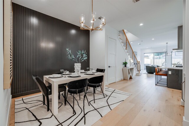 1937 W Clay St, Houston, TX 77019 - dining room with light wood finished floors, stairway, a chandelier, and recessed lighting