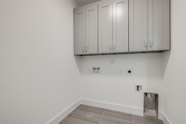 1937 W Clay St, Houston, TX 77019 - laundry area featuring hookup for an electric dryer, cabinet space, hookup for a washing machine, and gas dryer hookup