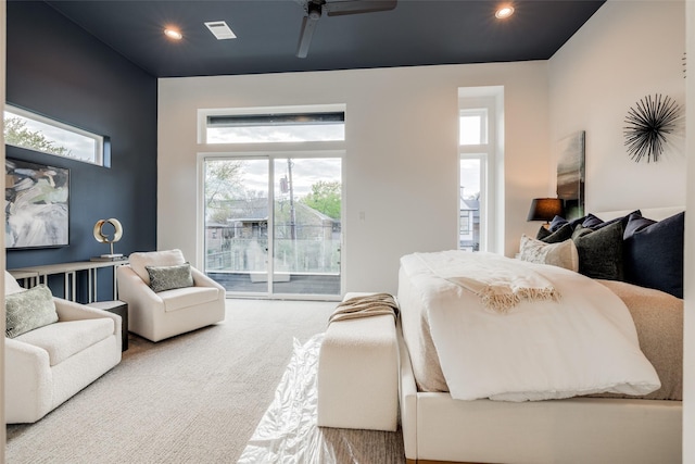 1937 W Clay St, Houston, TX 77019 - carpeted bedroom with access to exterior, multiple windows, recessed lighting, and a ceiling fan