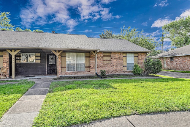 3822 Quiet Place Dr, Houston, TX 77082 - ranch-style home with a front lawn, brick siding, covered porch, and roof with shingles