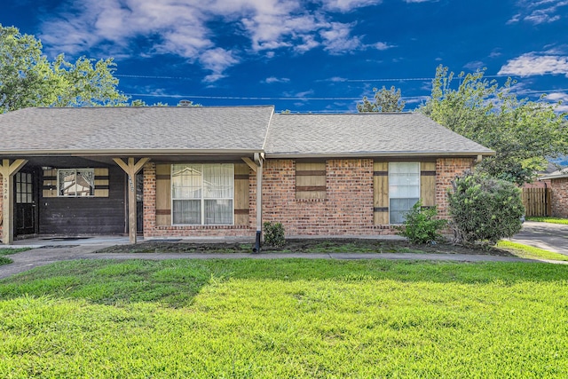 3822 Quiet Place Dr, Houston, TX 77082 - ranch-style house with brick siding, a front yard, and a shingled roof