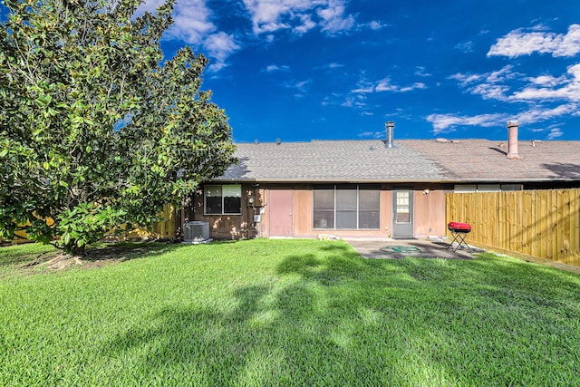 3822 Quiet Place Dr, Houston, TX 77082 - rear view of house featuring a patio and a shingled roof