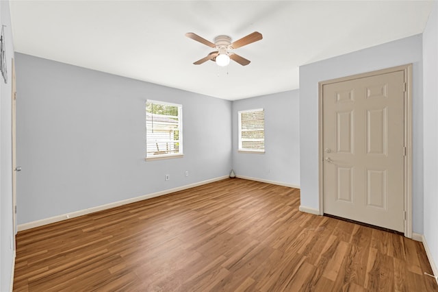 13915 Nitida St, Houston, TX 77045 - unfurnished bedroom featuring wood finished floors and a ceiling fan