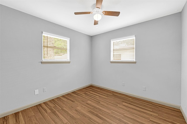 13915 Nitida St, Houston, TX 77045 - empty room featuring wood finished floors and a ceiling fan