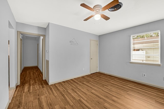 13915 Nitida St, Houston, TX 77045 - spare room with wood finished floors and a ceiling fan