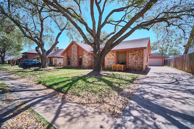 14835 Delbarton Dr, Houston, TX 77083 - mid-century home with brick siding and a garage