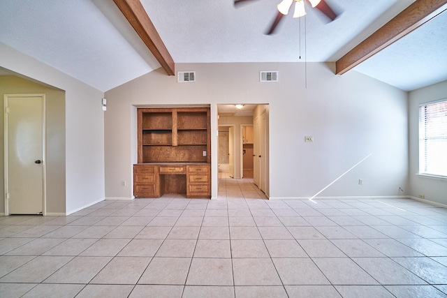14835 Delbarton Dr, Houston, TX 77083 - unfurnished living room featuring a ceiling fan, light tile patterned floors, built in shelves, and a textured ceiling