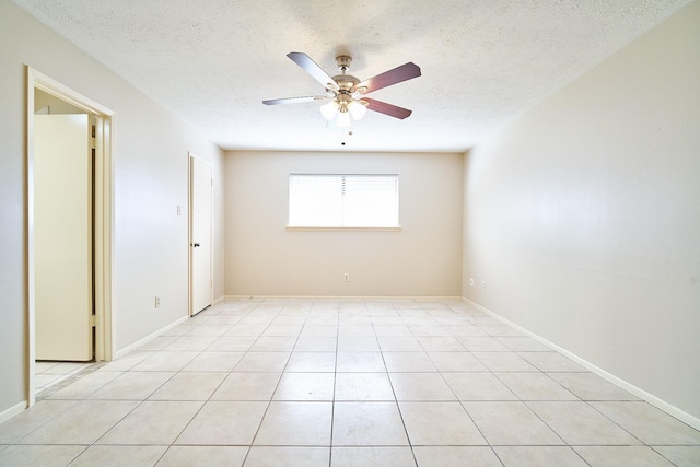 14835 Delbarton Dr, Houston, TX 77083 - unfurnished room featuring ceiling fan, a textured ceiling, and light tile patterned floors