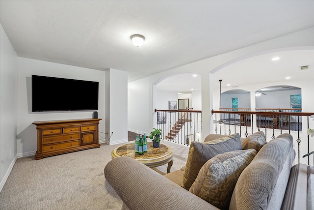 14610 Majestic Oaks, Magnolia, TX 77354 - living room featuring light colored carpet and arched walkways