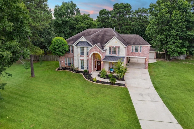 14610 Majestic Oaks, Magnolia, TX 77354 - view of front of home with driveway and brick siding