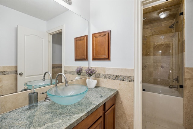 14610 Majestic Oaks, Magnolia, TX 77354 - full bath featuring vanity, tile walls, wainscoting,  shower combination, and tile patterned floors