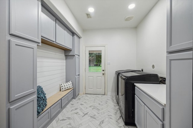 14610 Majestic Oaks, Magnolia, TX 77354 - washroom with separate washer and dryer, cabinet space, and recessed lighting