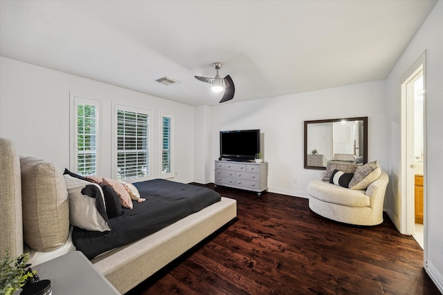 14610 Majestic Oaks, Magnolia, TX 77354 - bedroom with dark wood-style flooring, a ceiling fan, and ensuite bath