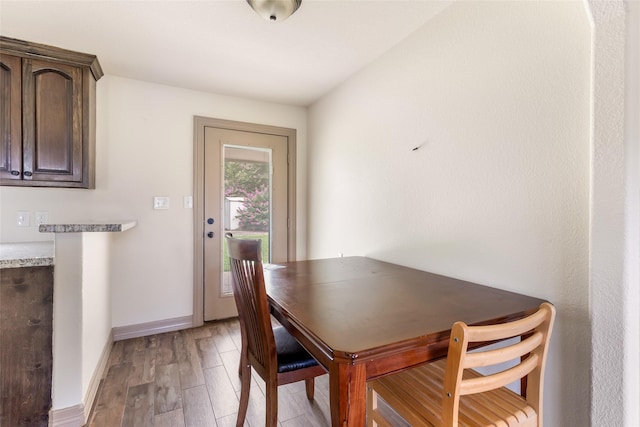 1407 Craig Dr, Galena Park, TX 77547 - dining room with light wood-type flooring and baseboards