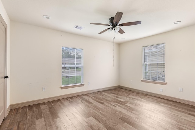 1407 Craig Dr, Galena Park, TX 77547 - unfurnished room with wood finished floors and a ceiling fan